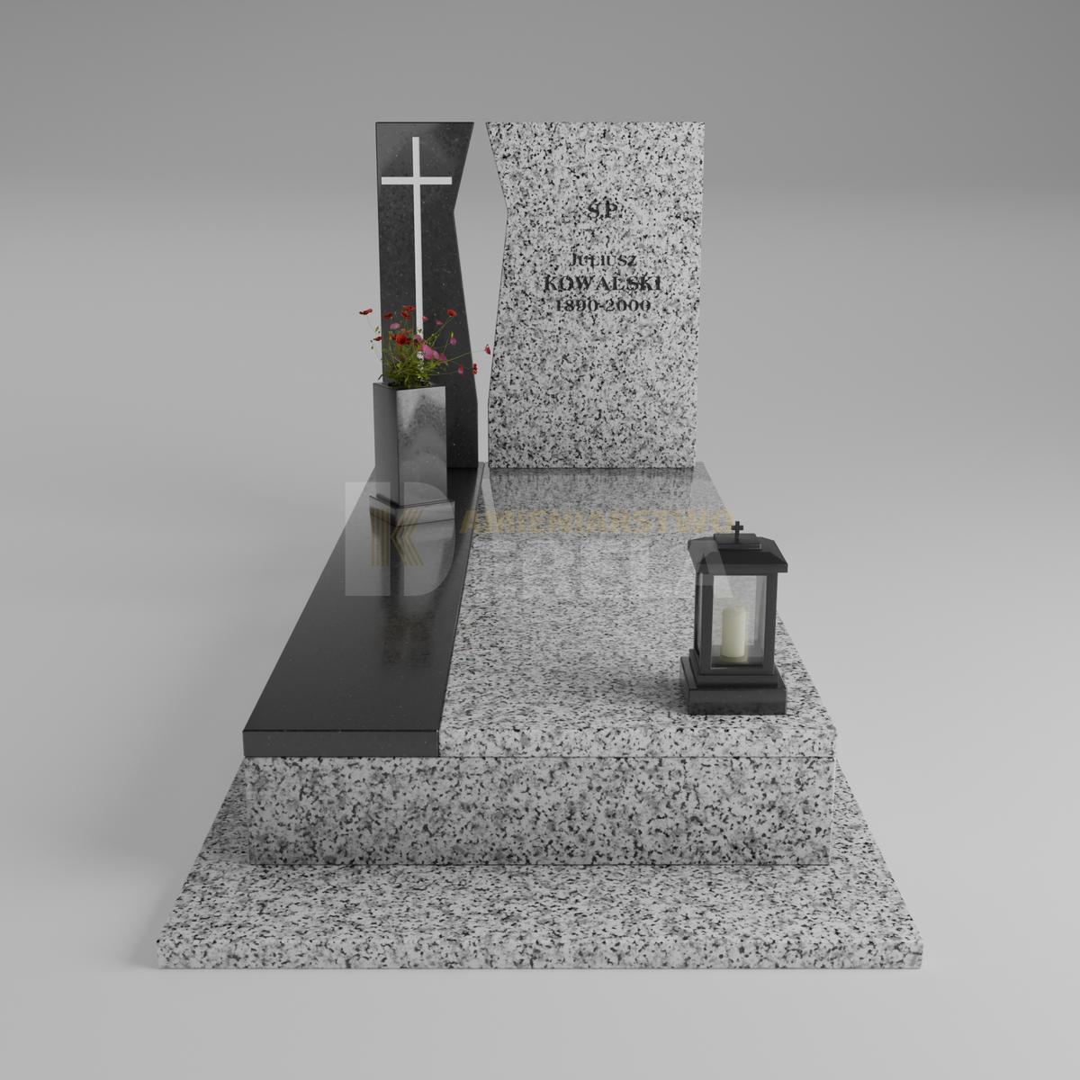 ciemny pomnik granitowy z frontu