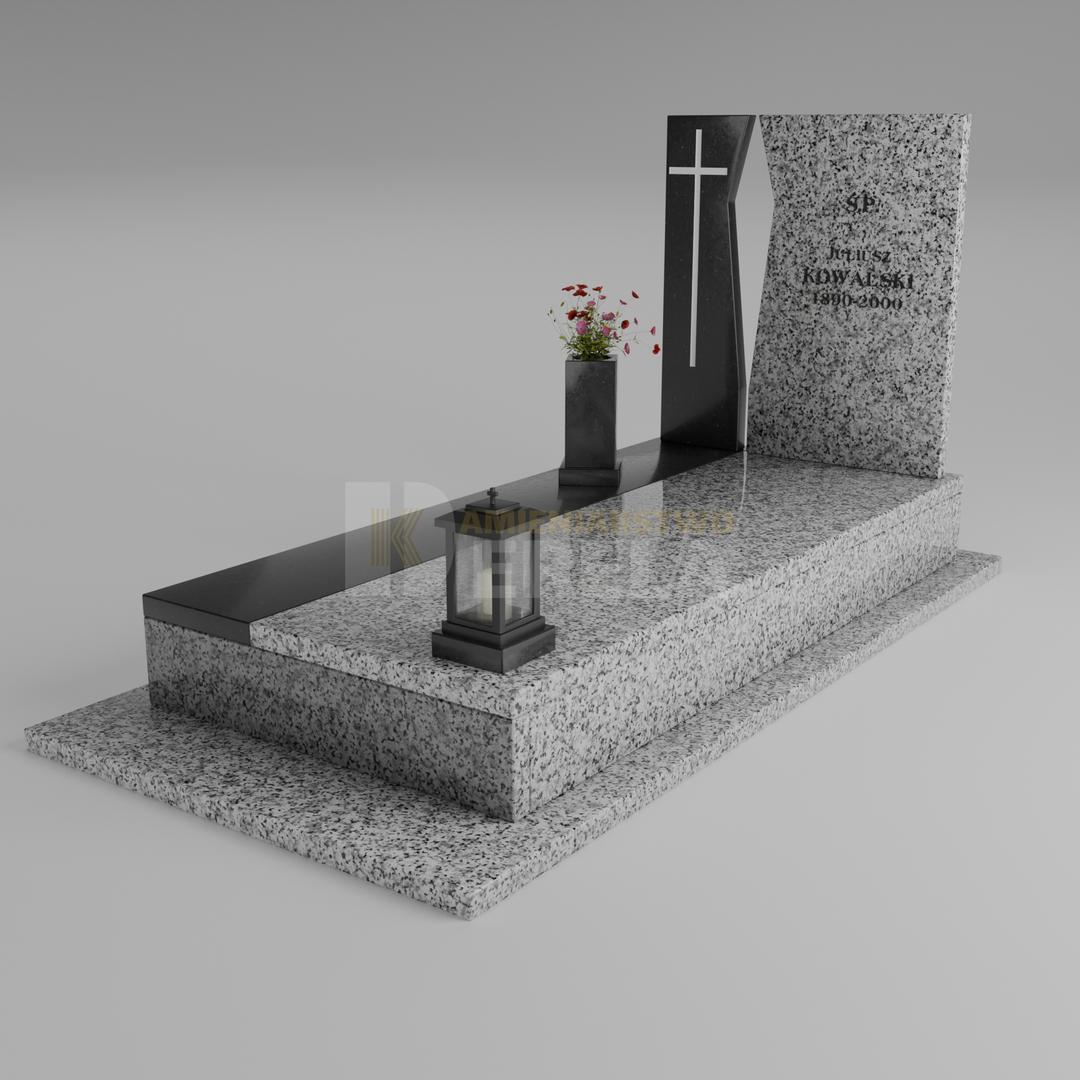 ciemny pomnik granitowy z skosu