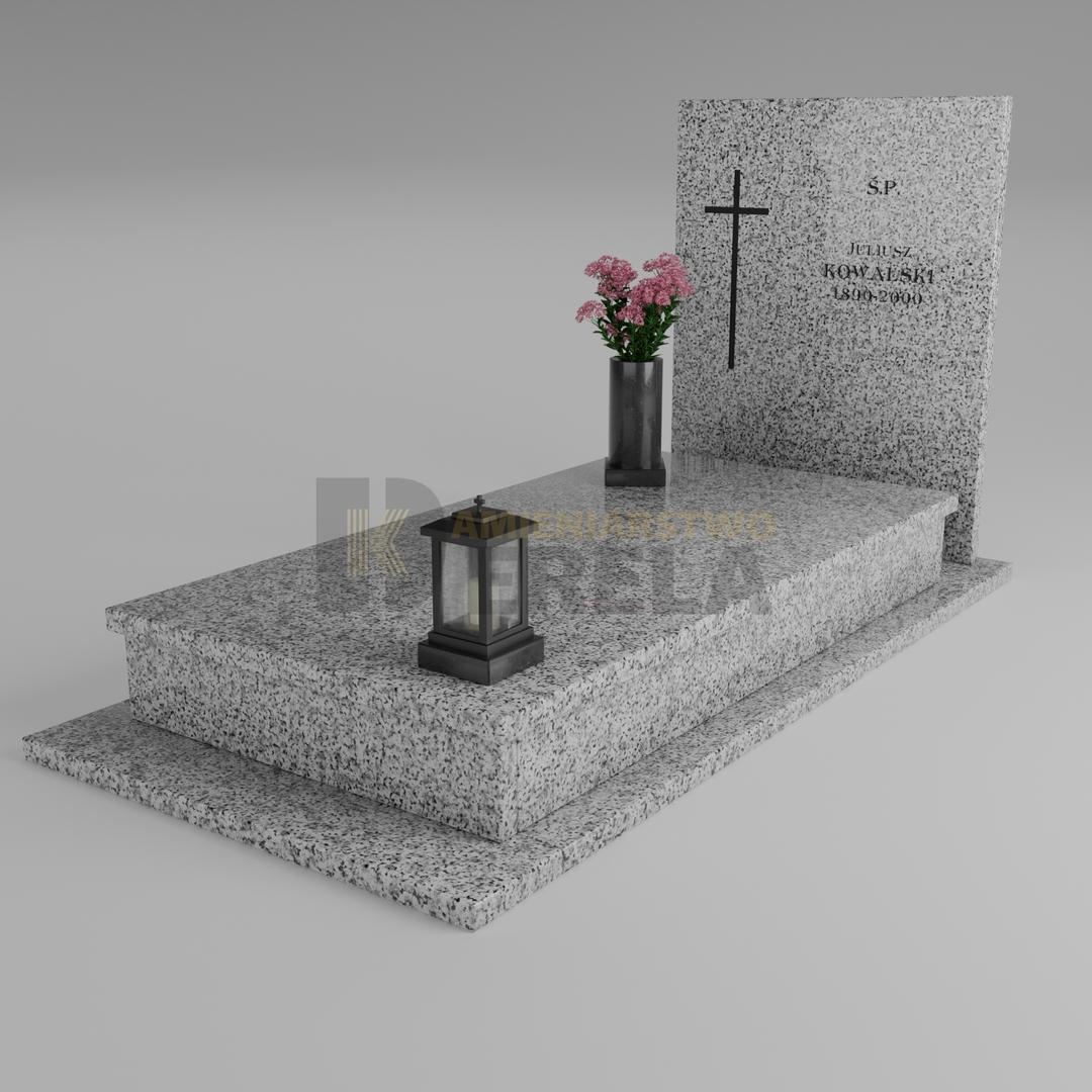 ciemny pomnik granitowy z skosu