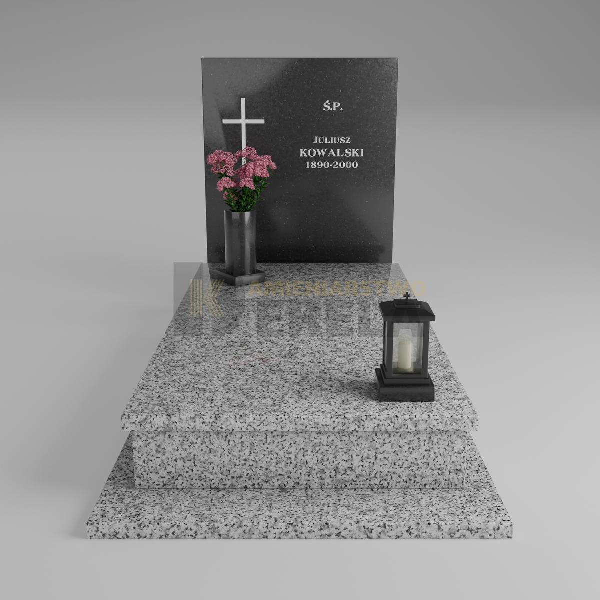 ciemny pomnik granitowy z frontu