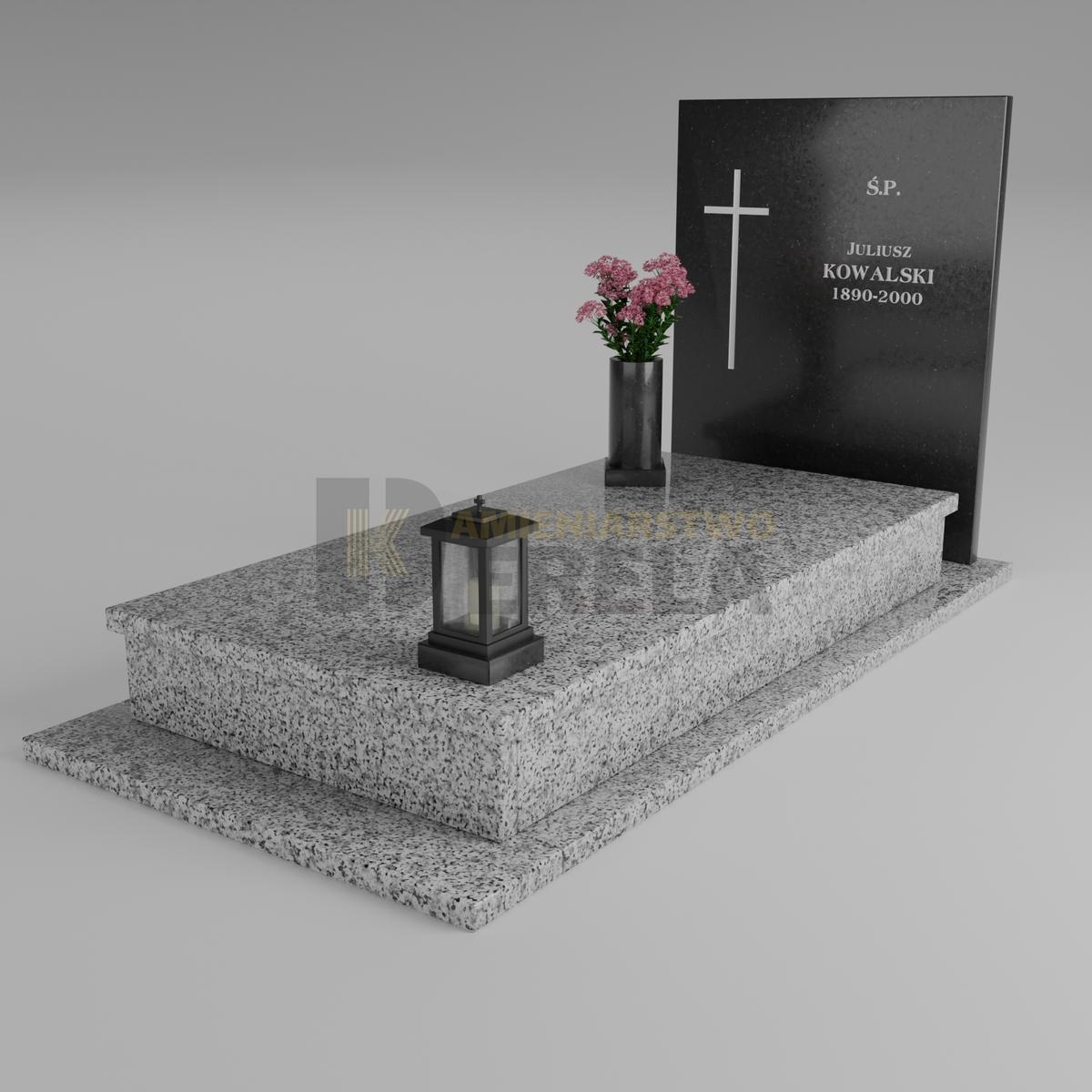 ciemny pomnik granitowy z skosu