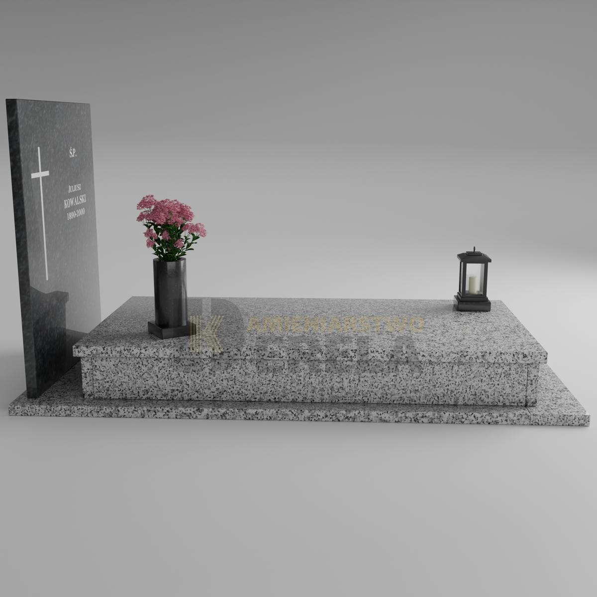 ciemny pomnik granitowy z lewej strony