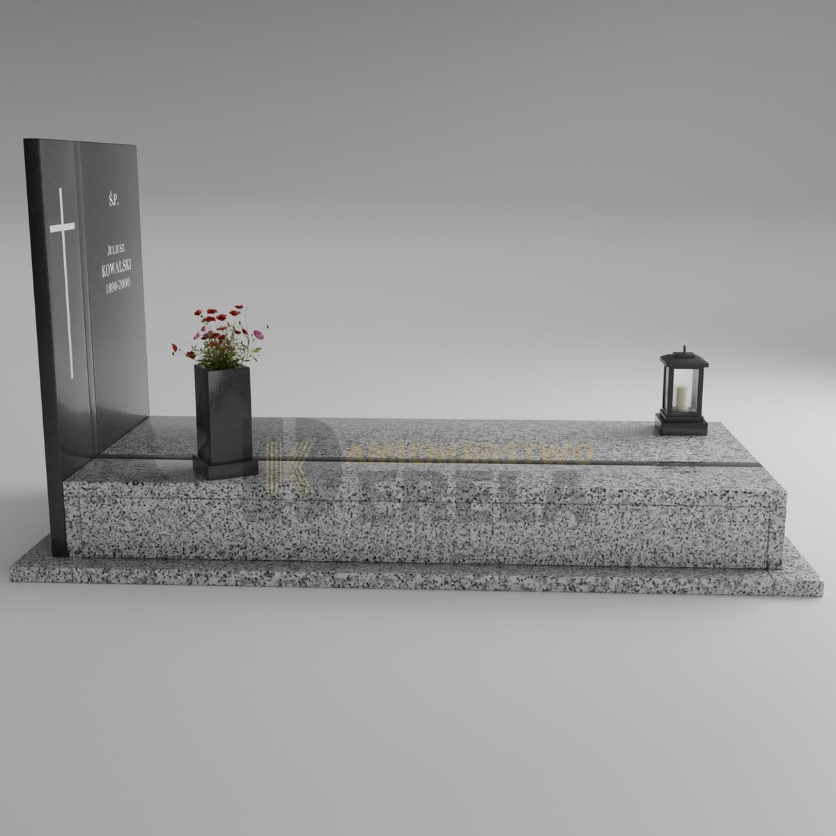 ciemny pomnik granitowy z lewej strony