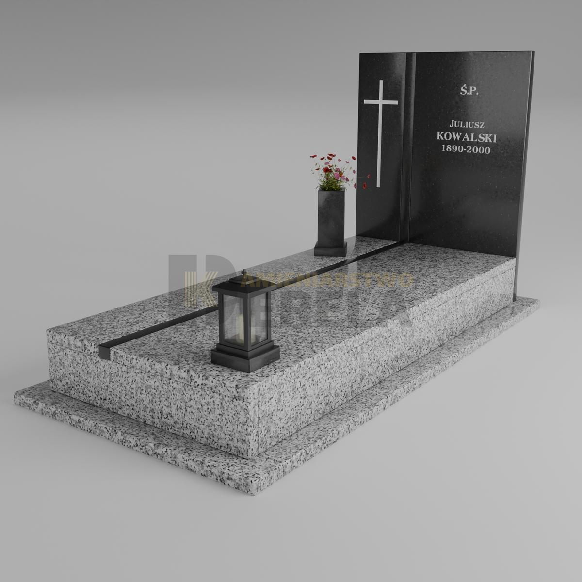 ciemny pomnik granitowy z skosu