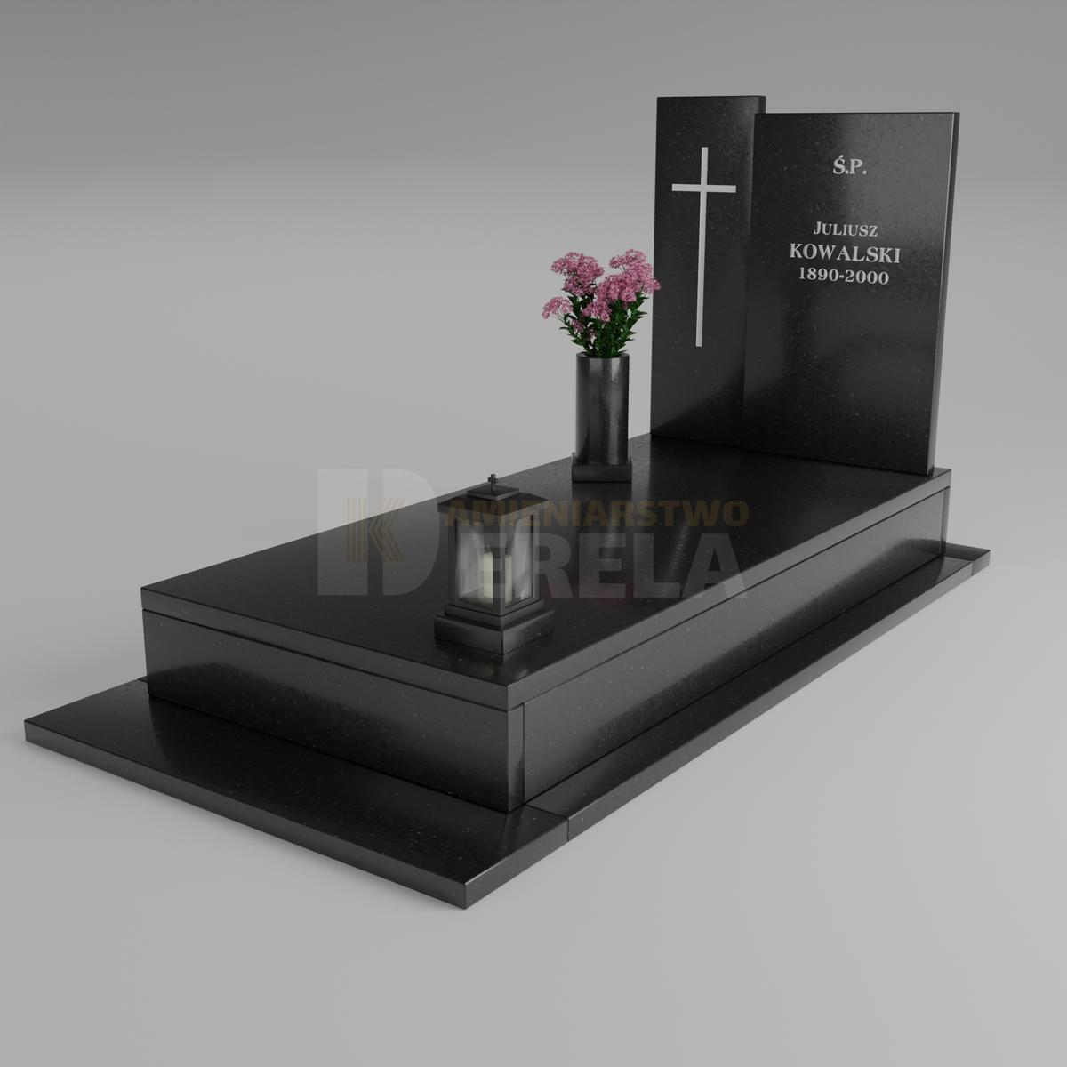 ciemny pomnik granitowy z skosu