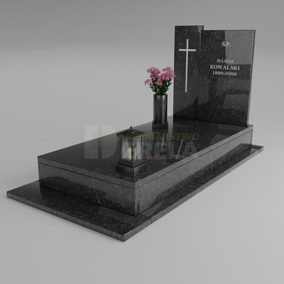 ciemny pomnik granitowy z skosu