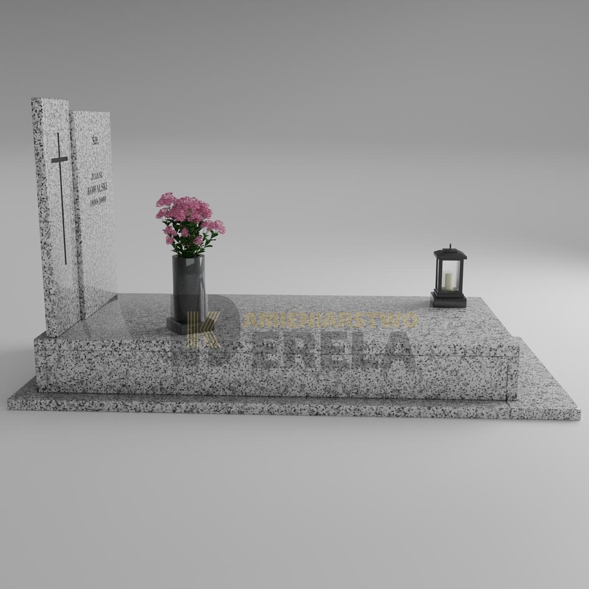 ciemny pomnik granitowy z lewej strony