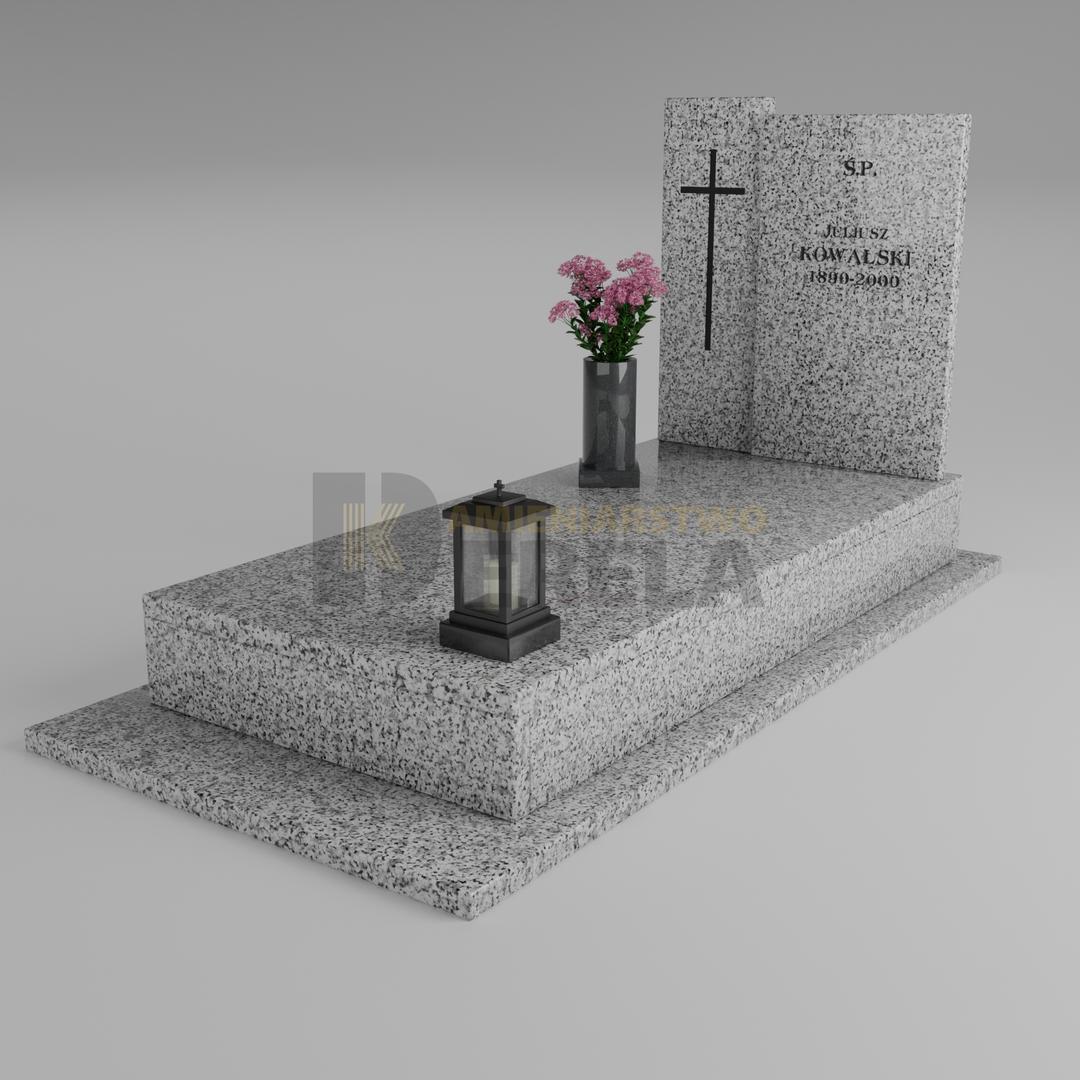 ciemny pomnik granitowy z skosu