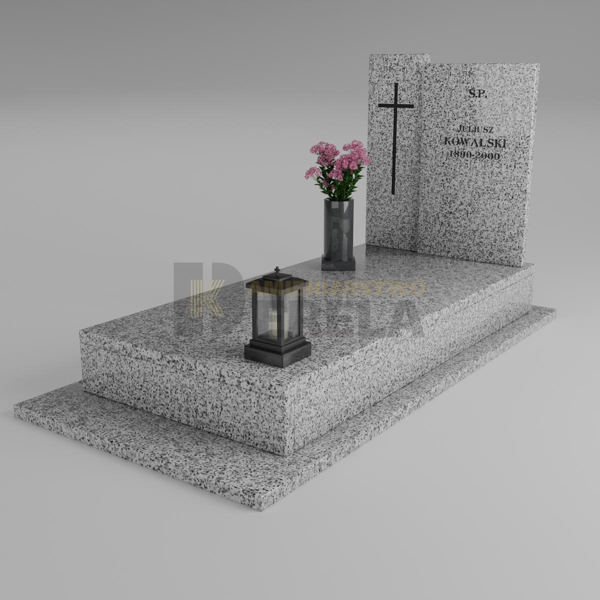 ciemny pomnik granitowy z skosu