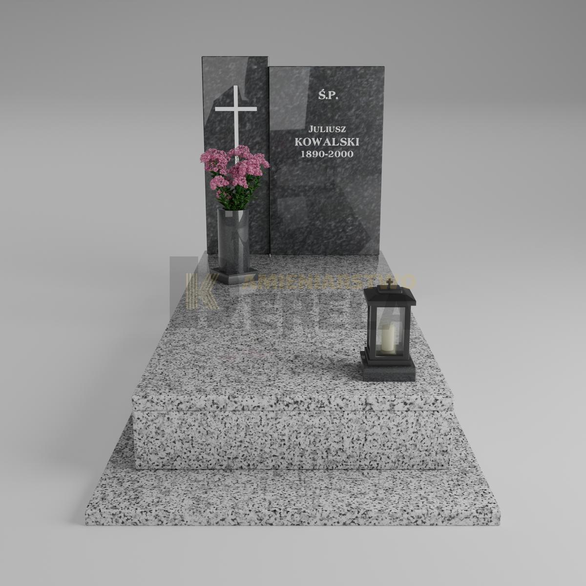 ciemny pomnik granitowy z frontu