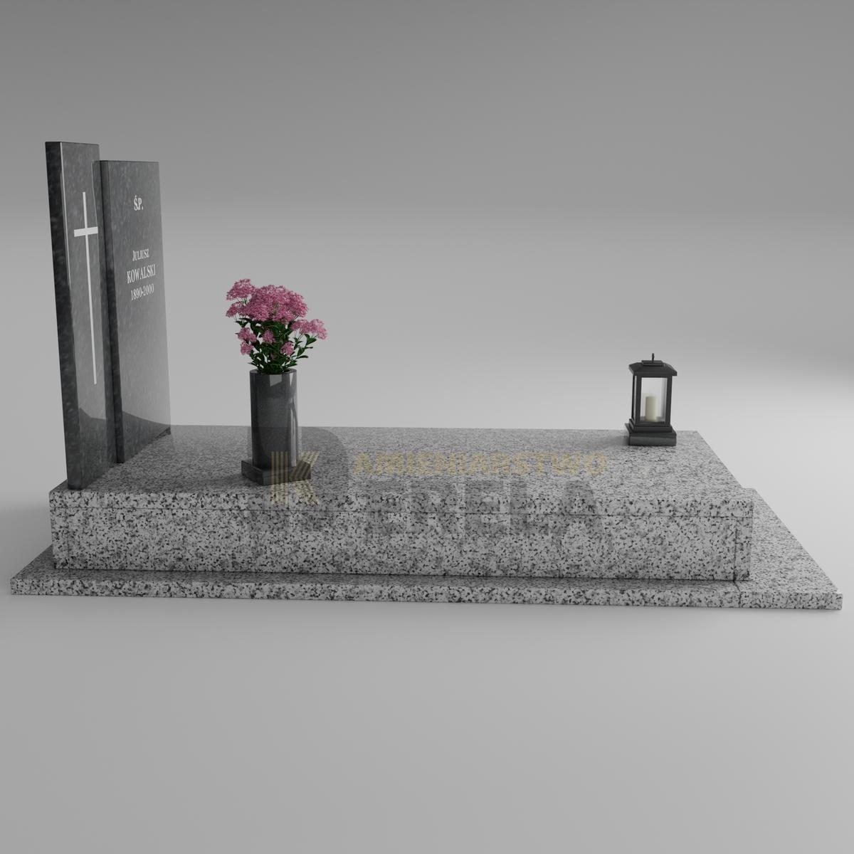 ciemny pomnik granitowy z lewej strony