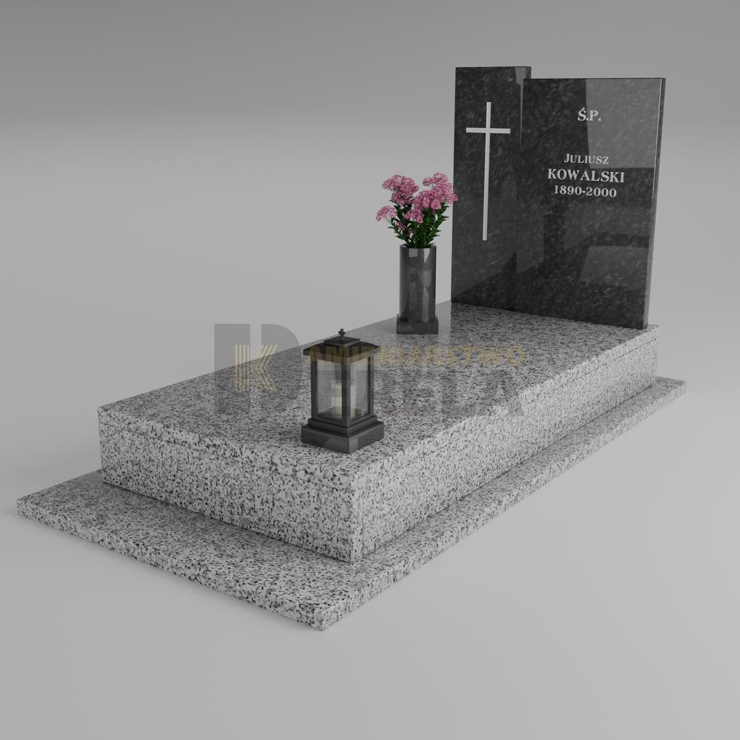 ciemny pomnik granitowy z skosu